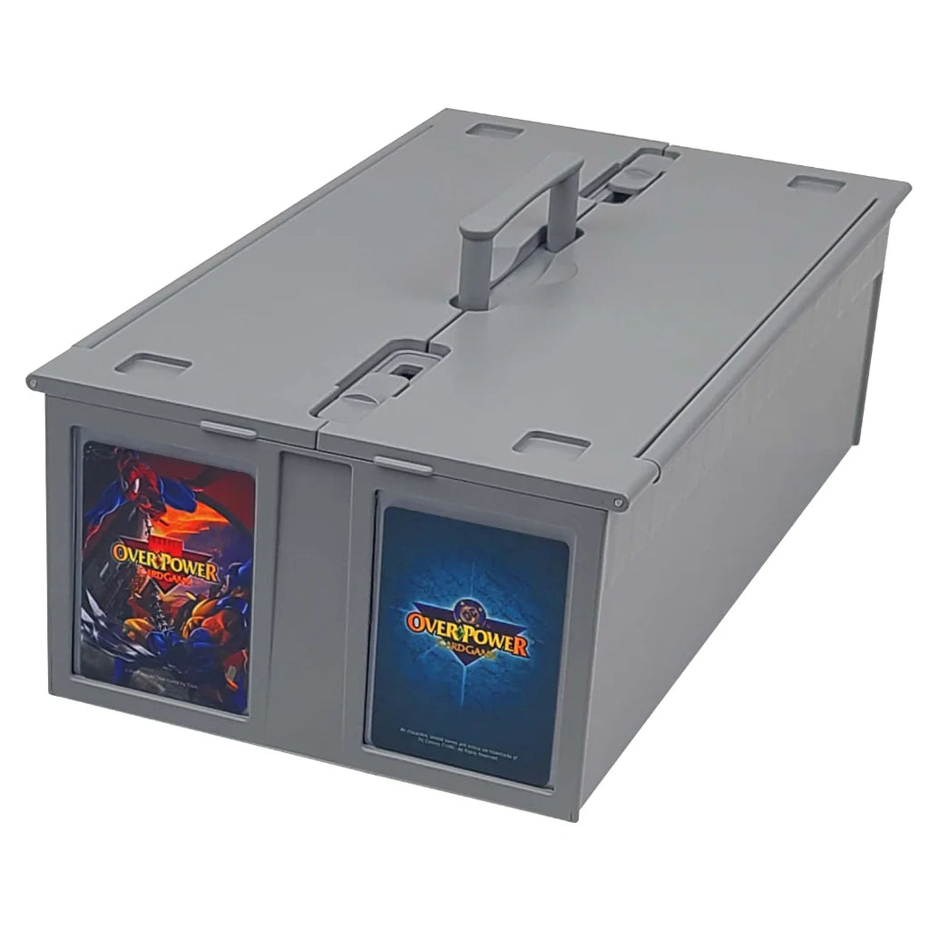 A BCW gray plastic storage box with a handle on top and two clear front windows displaying collectible cards. The left window shows an Overpower 6 card, and the right window shows an Overpower card, set against a plain white background.