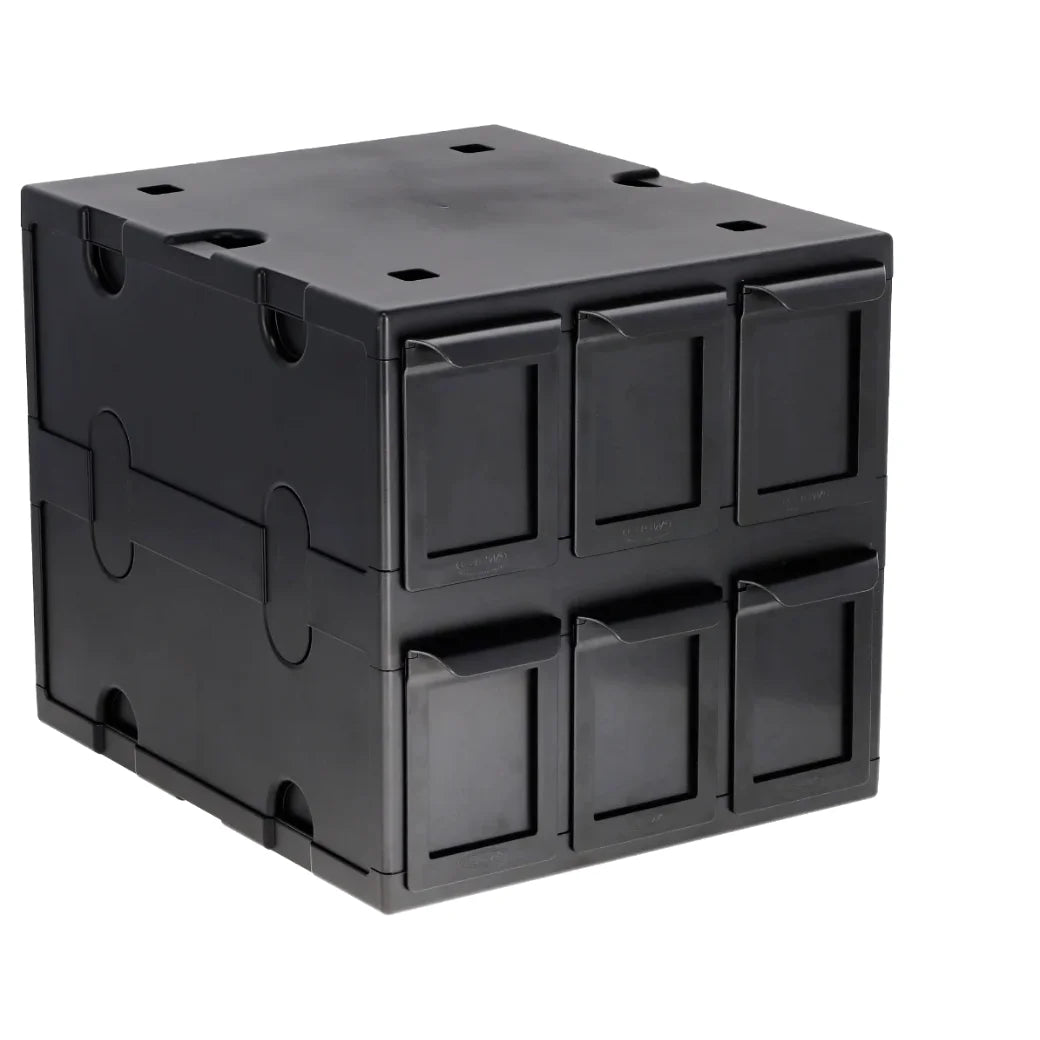 A BCW black plastic modular storage box with six small front-facing compartments, shown on a plain white background.