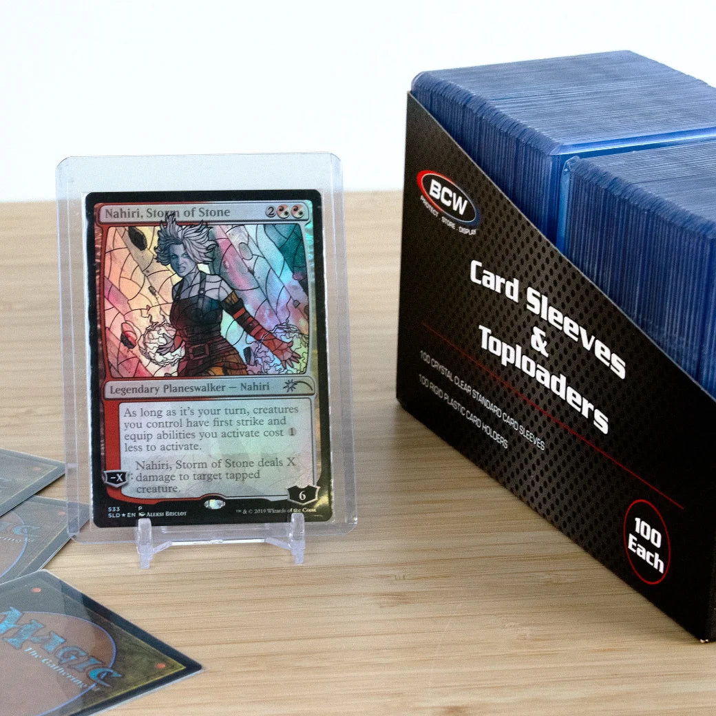 BCW card sleeve packaging with a trading card on a wooden surface