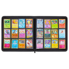 An open black card binder filled with multiple colorful Pokémon trading cards, photographed flat against a plain white background.